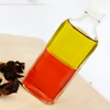 Płyn dwufazowy z olejem awokado i naparem hibiskusa do oczyszczania twarzy