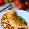 Omlet z pomidorem, cebulą i cukinią
