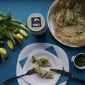 Pierogi ze szpinakiem i filetem śledziowym w suszonych pomidorach