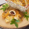 Pieczone pierogi z kaczką i karmelizowaną cebulą z żurawiną