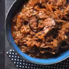 Bigos z kiełbasą i ciemnym piwem