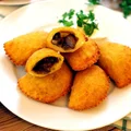 Pierogi ziemniaczane z pieczarkami