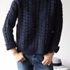 sweter ze wzorem warkocza