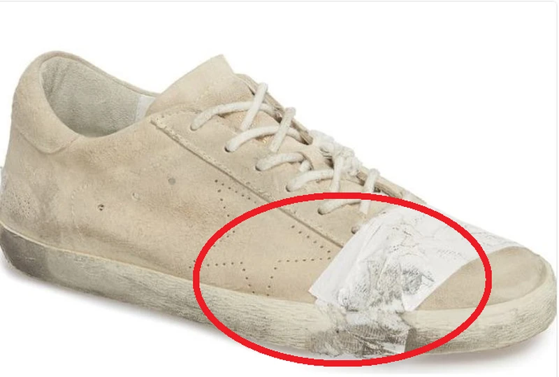 Buty sklejone taśmą za 2000 zł.  Luksusowa marka oskarżona o drwinę z biednych ludzi!