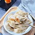 Pierogi z soczewicą, suszonymi pomidorami i wędzonym twarogiem