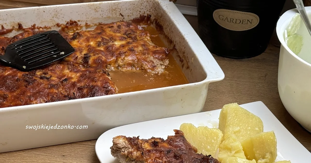 Schab zapiekany pod mięsem mielonym i żółtym serem