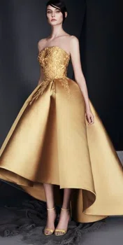 Złota asymetryczna suknia