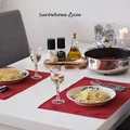 Spaghetti z cukinią i boczkiem w czerwonym sosie
