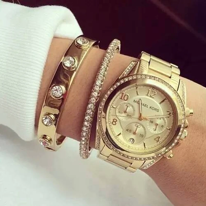 Michael Kors i złote bransoletki