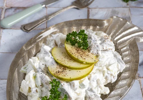 Śledzie w śmietanie