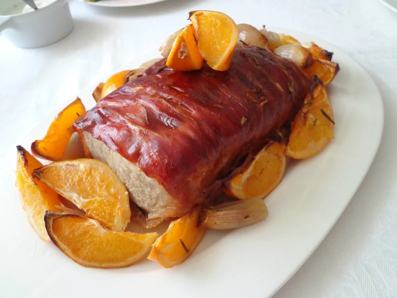 Pieczony schab z szynką parmeńską i pomarańczami